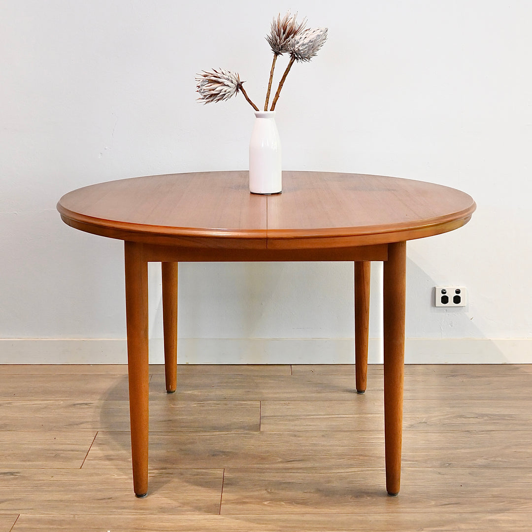 Mid Century Teak Round Extendable Dining Table by Chiswell (table only).