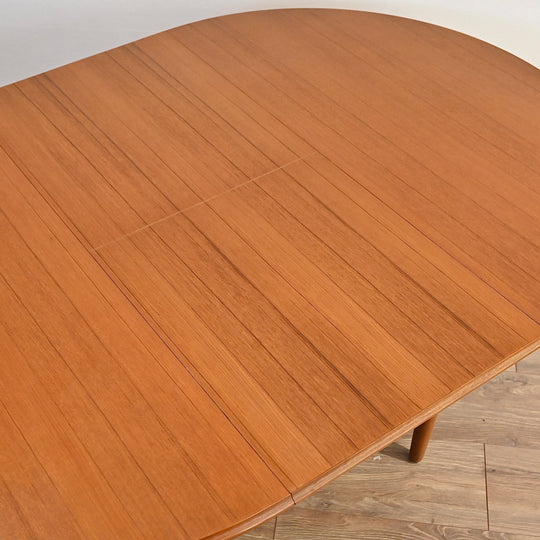 Mid Century Teak Round Extendable Dining Table by Chiswell (table only).