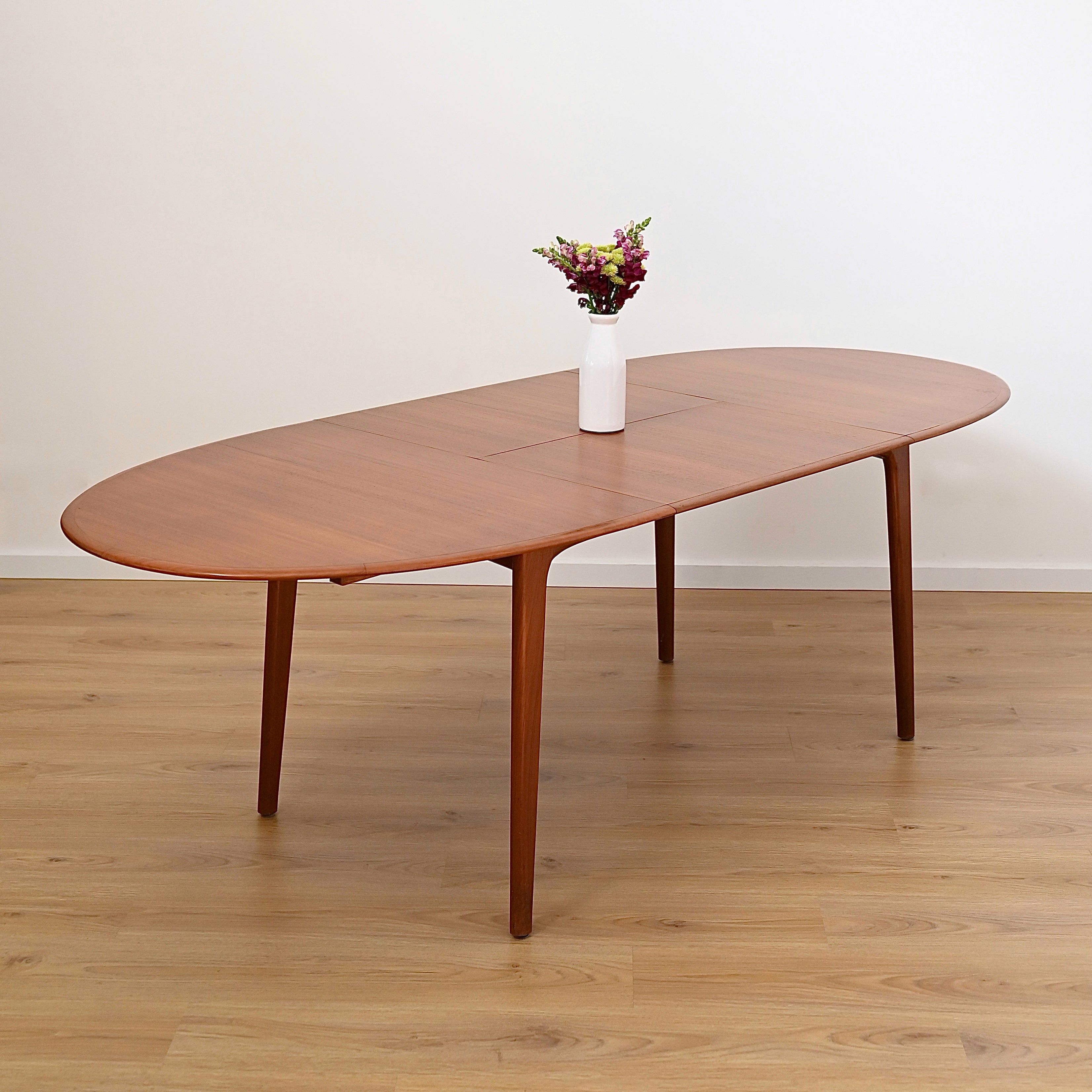 Mid Century Teak Extendable Oval Dining Table by Noblett