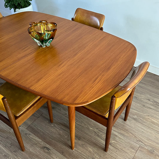 Mid Century Parker Elliptical Dining Table With Butterfly Extension Leaf