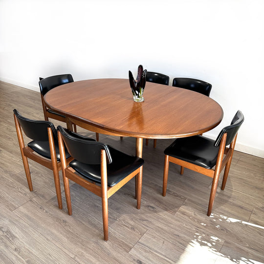 Mid Century Dining Suite G-Plan Round Extension Table and 6 x Chiswell Black Vinyl Dining Chairs