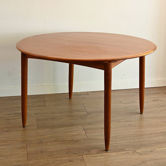 Mid Century Teak Round Extendable Dining Table by Dickinson