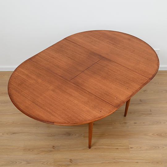 Parker Teak Round Extendable Dining Table