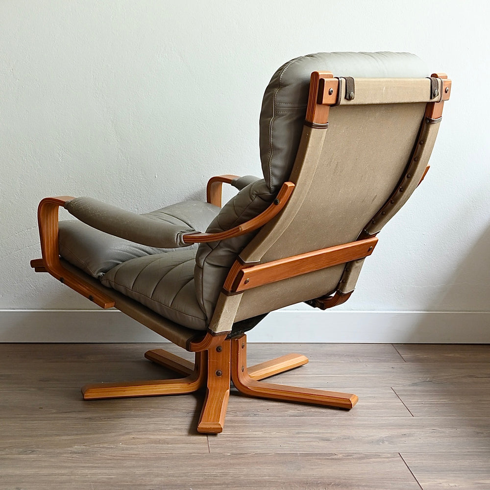 Mid Century Tessa T8 Leather Swivel Armchair