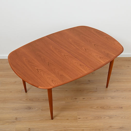 Parker Teak Elliptical D end Extendable Dining Table