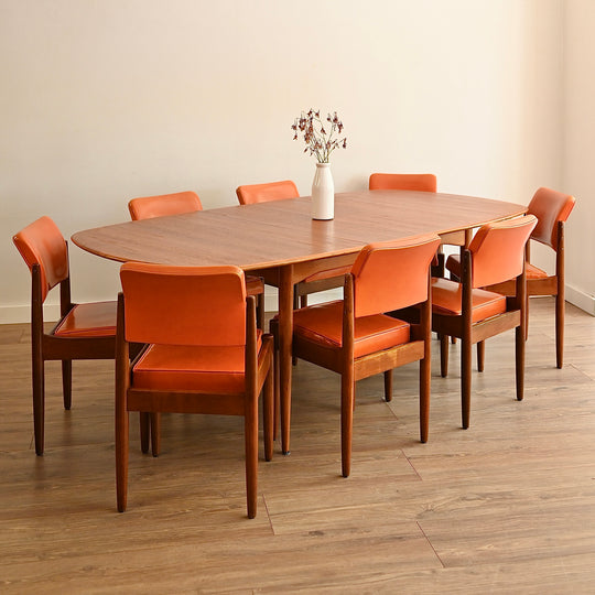 8x Mid Century Teak and Orange Vinyl Dining Chairs by Chiswell